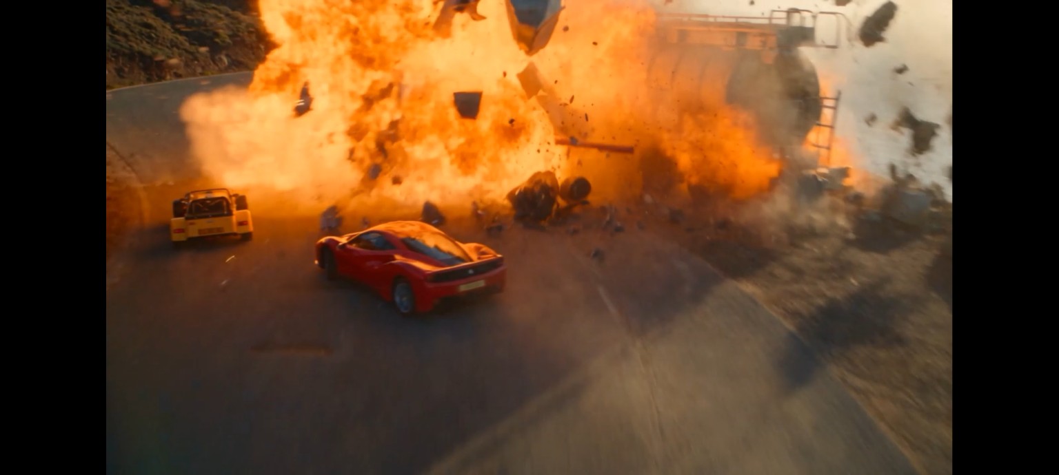 An action-film scene featuring the Westfield and an enormous explosion