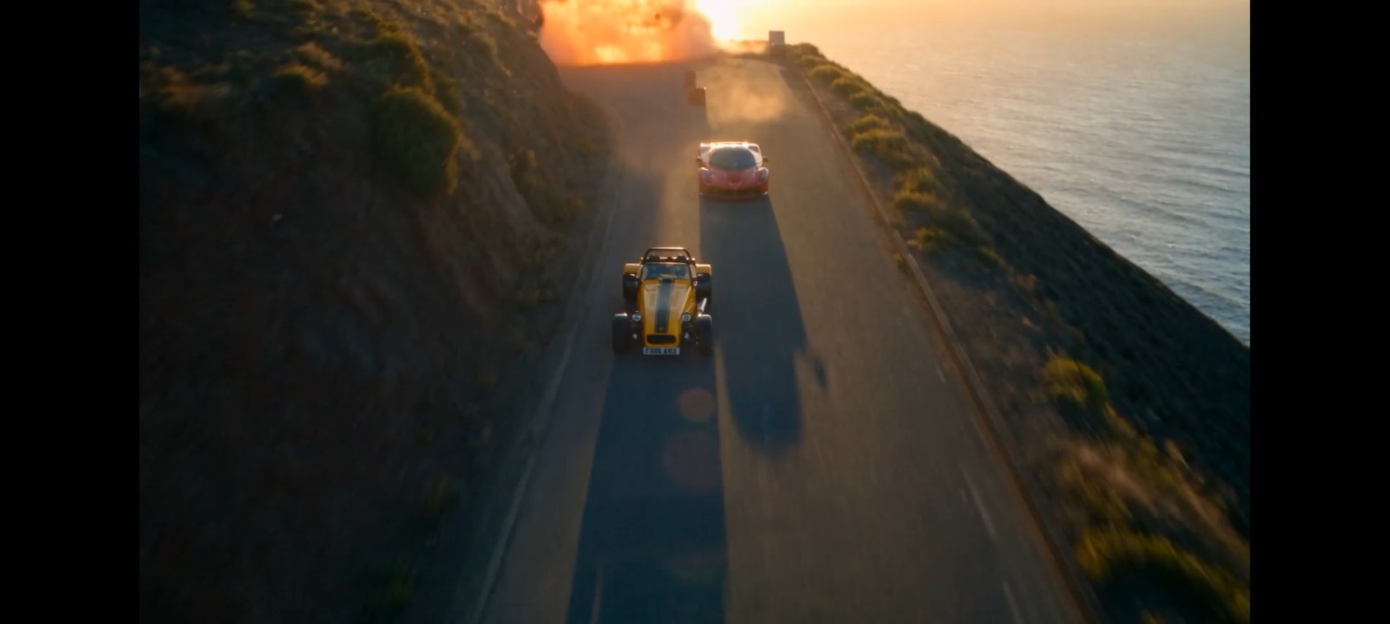 Yellow Westfield on a dramatic coastal road